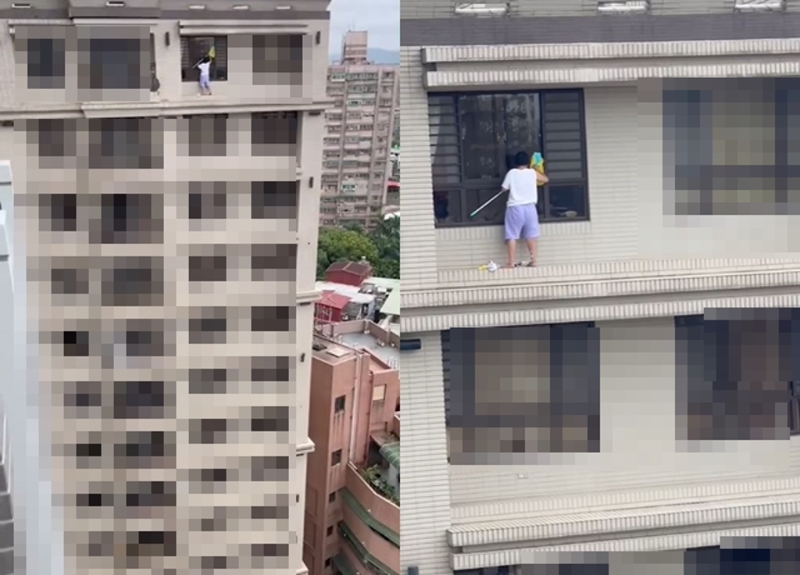 妇人站在15楼高外擦窗