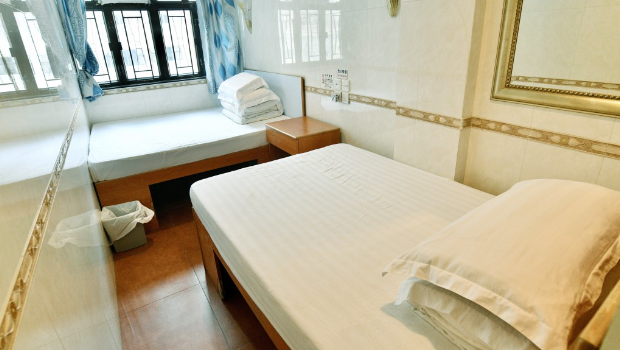尖沙咀宾馆平日房租200元的普通双人房，节日期间需逾500元。